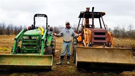 track hoe vs tractor